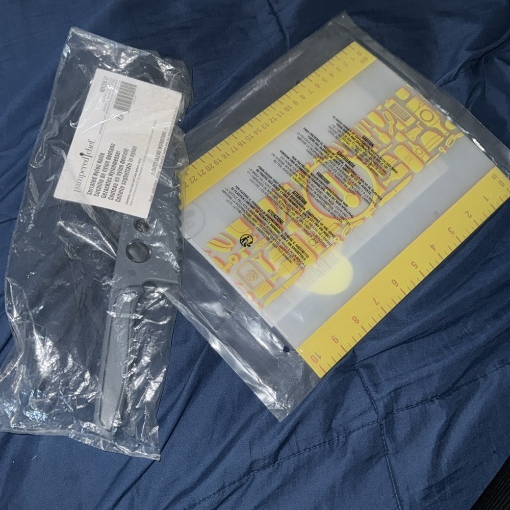 Pampered chef serated nylon knife & flexible cutting mats
